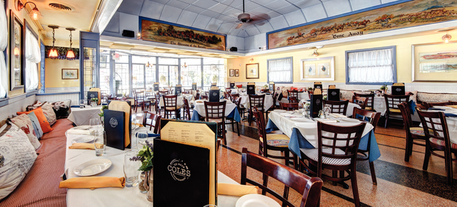 A view of the dining room of Coles. 