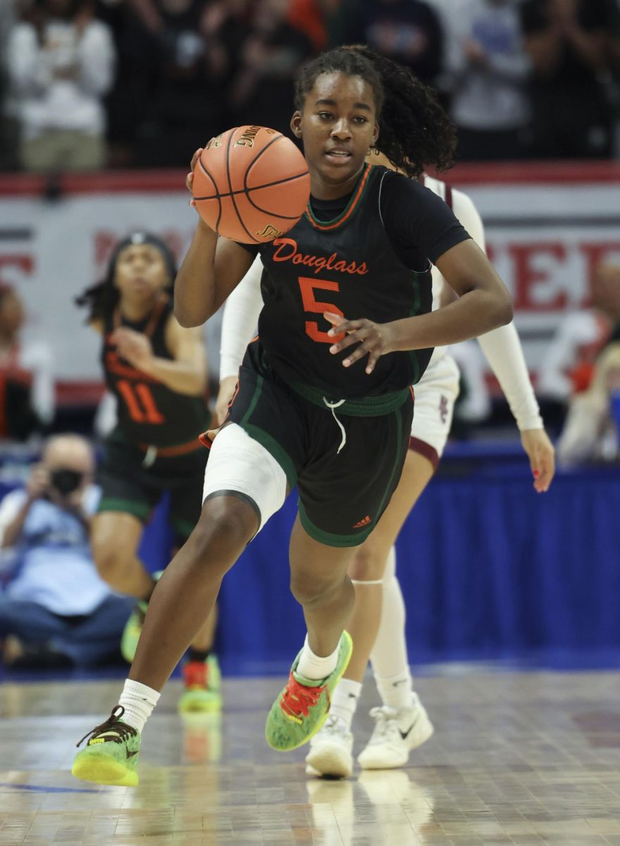 Frederick Douglass high school's Peighton Okorle brings the ball up court during the KHSAA Clark’s Pump-N-Shop Girls’ Basketball Sweet 16 tournament as Henderson County plays Frederick Douglass at Rupp Arena on Wednesday, March 11, 2026, in Lexington, Ky.. Photo by Kate Bonafede