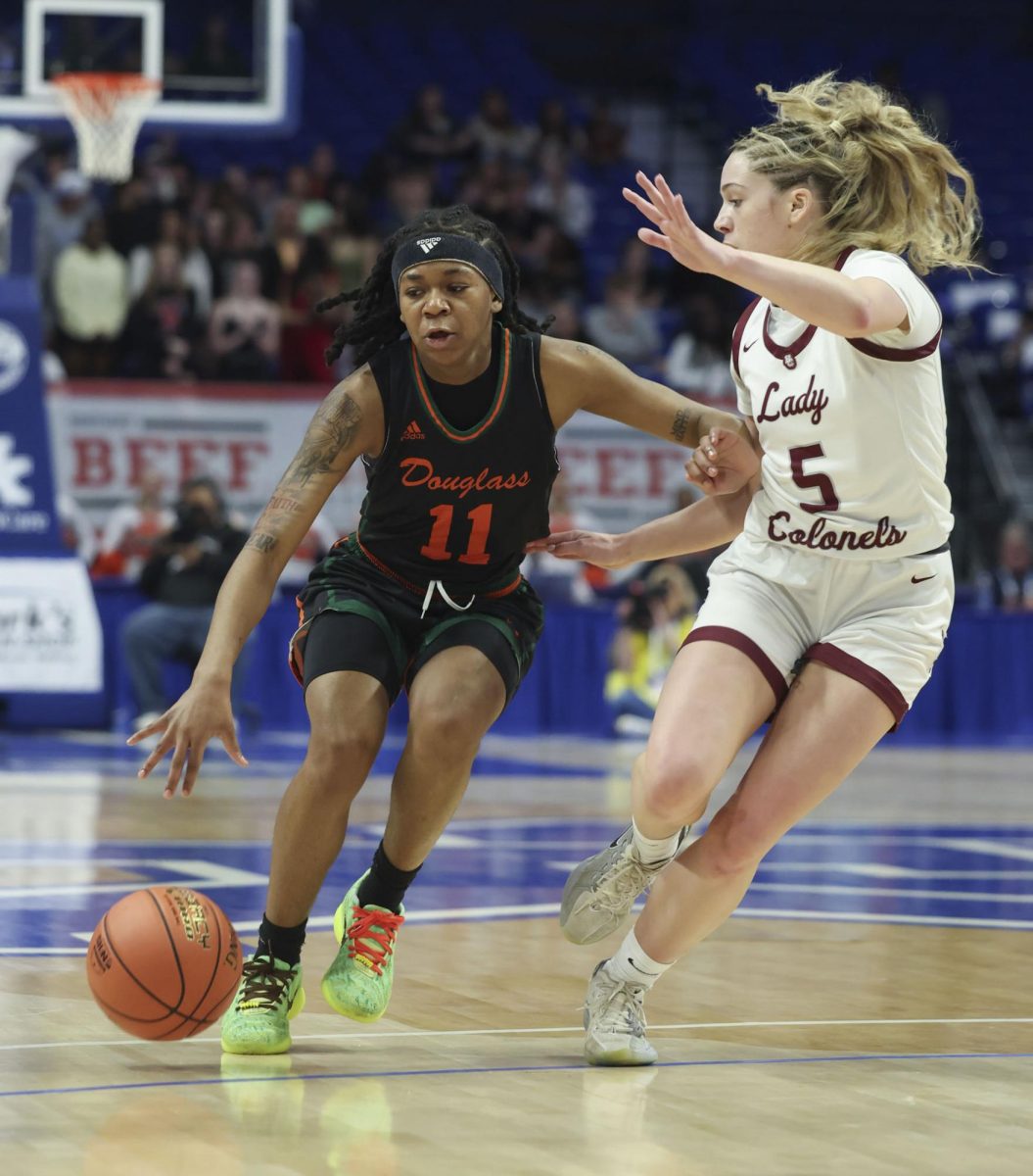 Frederick Douglass high school's Mikalee Bennett fights for position against Henderson County high school's Adalyn Gish during the KHSAA Clark’s Pump-N-Shop Girls’ Basketball Sweet 16 tournament as Henderson County plays Frederick Douglass at Rupp Arena on Wednesday, March 11, 2026, in Lexington, Ky.. Photo by Kate Bonafede
