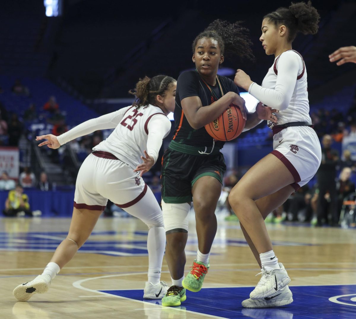 Frederick Douglass high school's Peighton Okorley drives to the basket for a layup during the KHSAA Clark’s Pump-N-Shop Girls’ Basketball Sweet 16 tournament as Henderson County plays Frederick Douglass at Rupp Arena on Wednesday, March 11, 2026, in Lexington, Ky.. Photo by Kate Bonafede